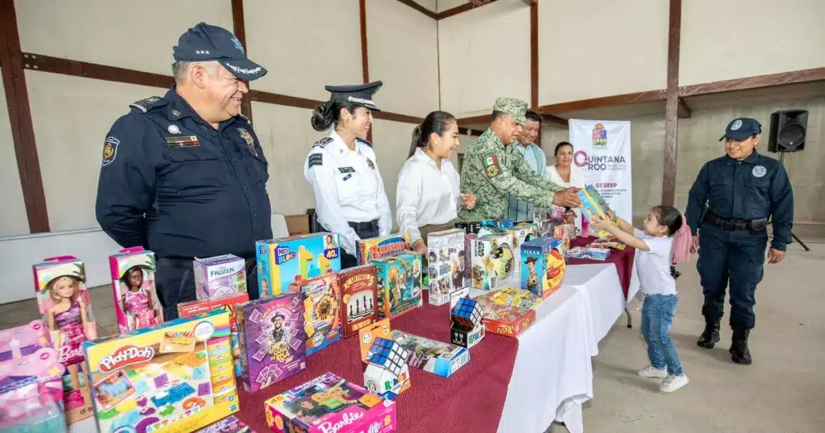 Residents take part in the voluntary gun surrender fair in Playa del Carmen, Quintana Roo