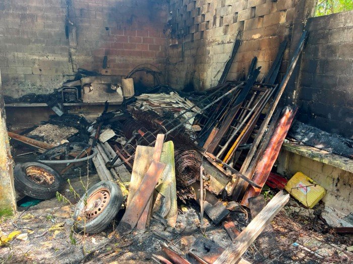 Firefighters extinguish a fire at a warehouse in Playa del Carmen