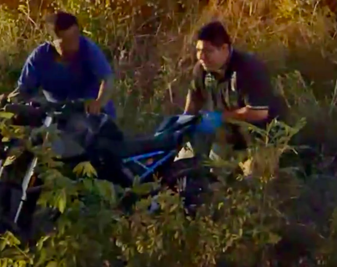 Motorcycle crash scene on the Playa del Carmen-Puerto Morelos highway where an Xcaret worker died