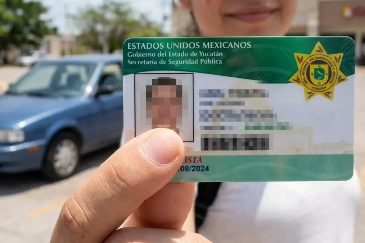 People wait in line to renew driver's licenses at a government office in Yucatan.