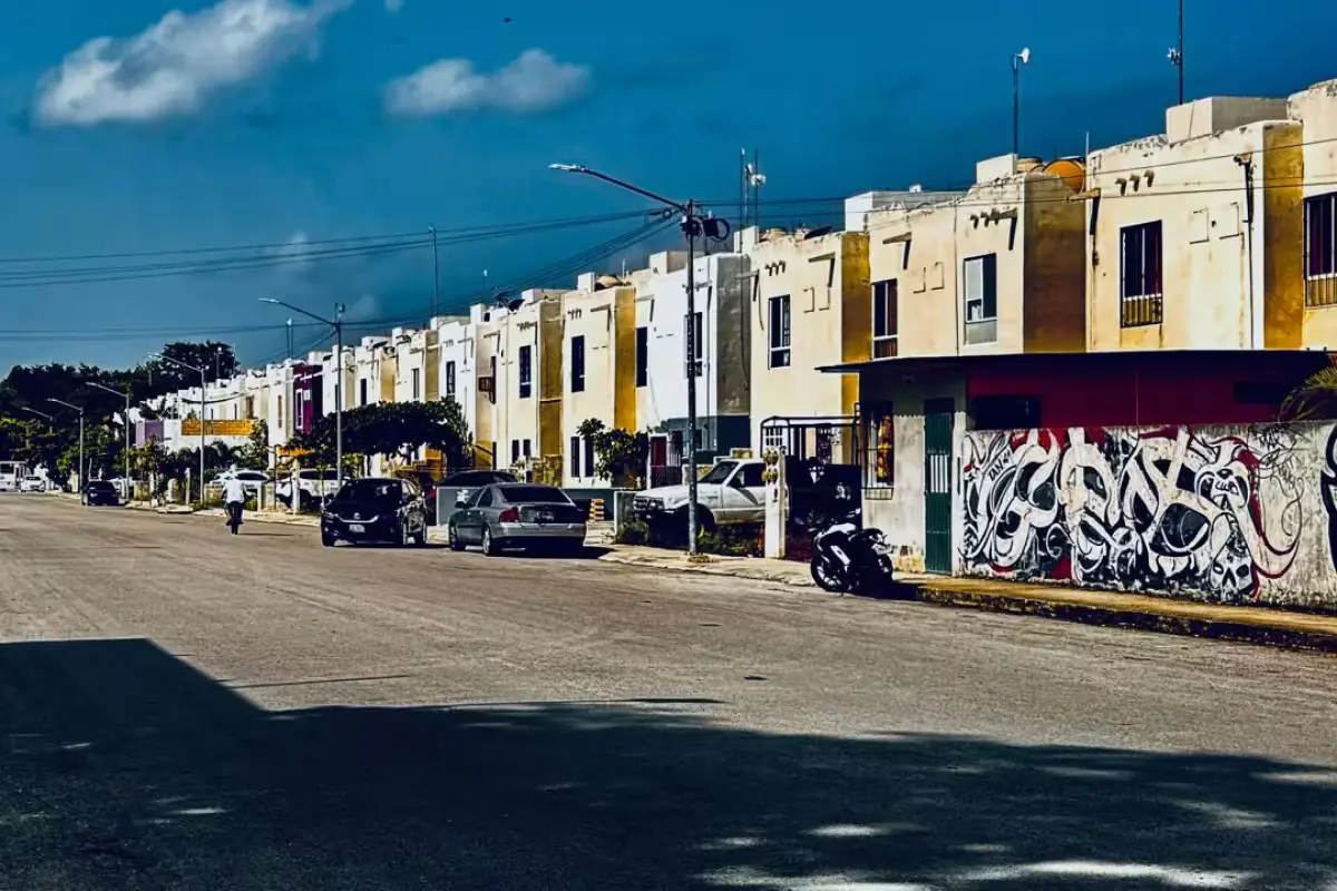 Cleared forest land next to new residential construction in Playa del Carmen, Quintana Roo