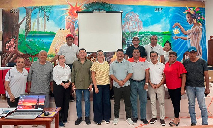 AGEPRO officials and Ejido Bacalar representatives discuss land regularization during a working meeting
