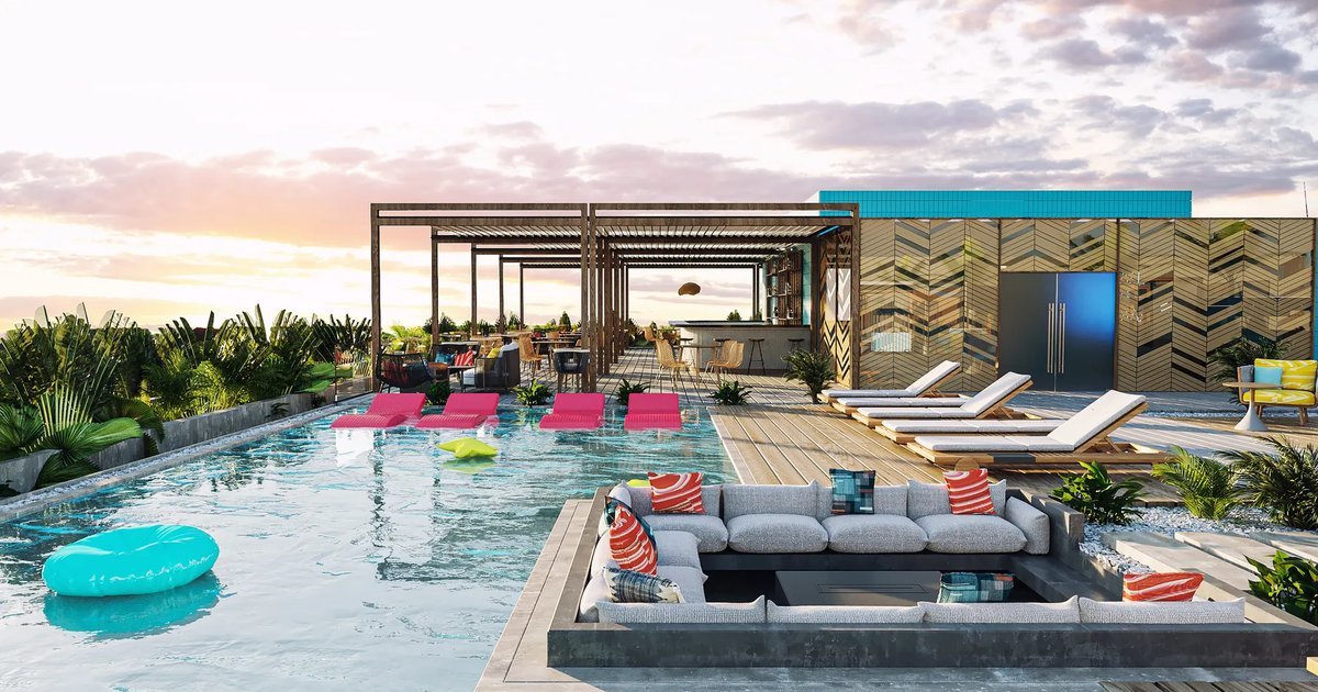 Modern Aloft by Marriott hotel building in Playa del Carmen, steps from Quinta Avenida, with rooftop terrace and pool