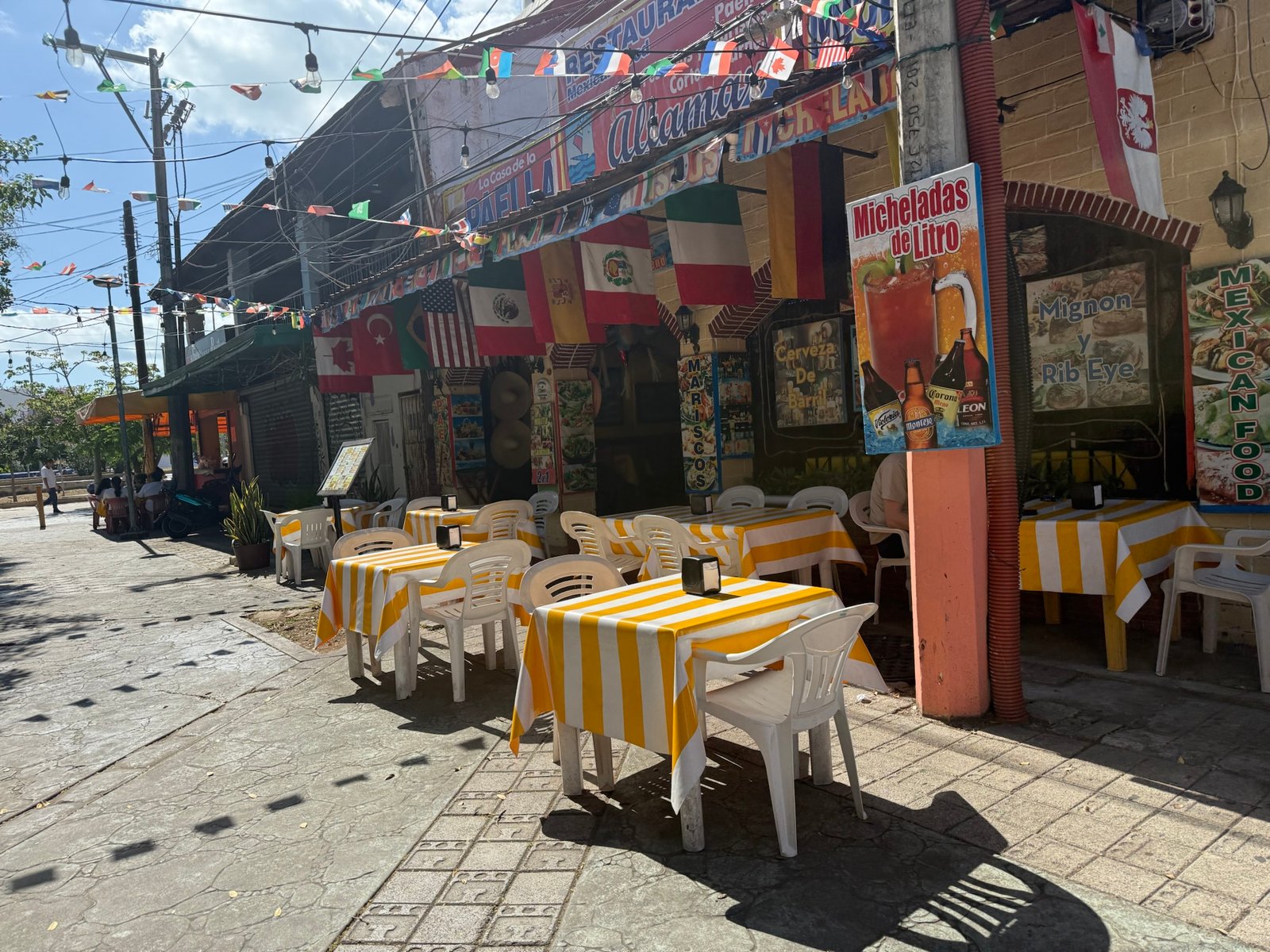 Empty tables and chairs on the terrace of a restaurant in Cancún, Quintana Roo, during the low tourism season