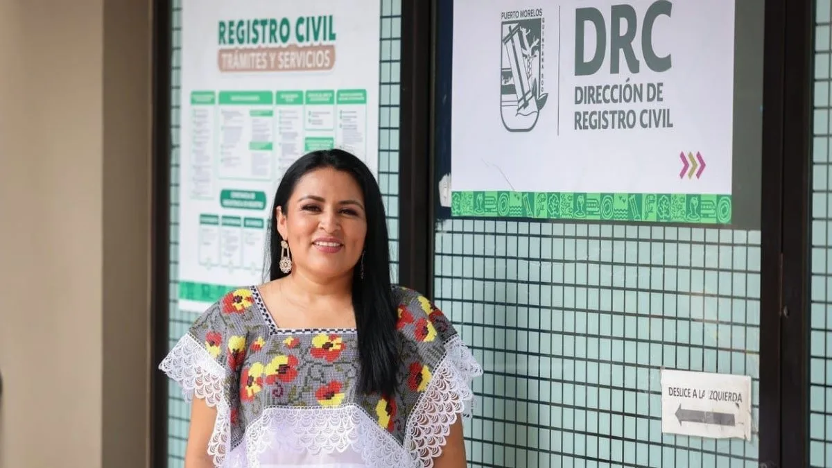 Municipal Civil Registry staff assisting residents during an outreach event in Puerto Morelos, Quintana Roo