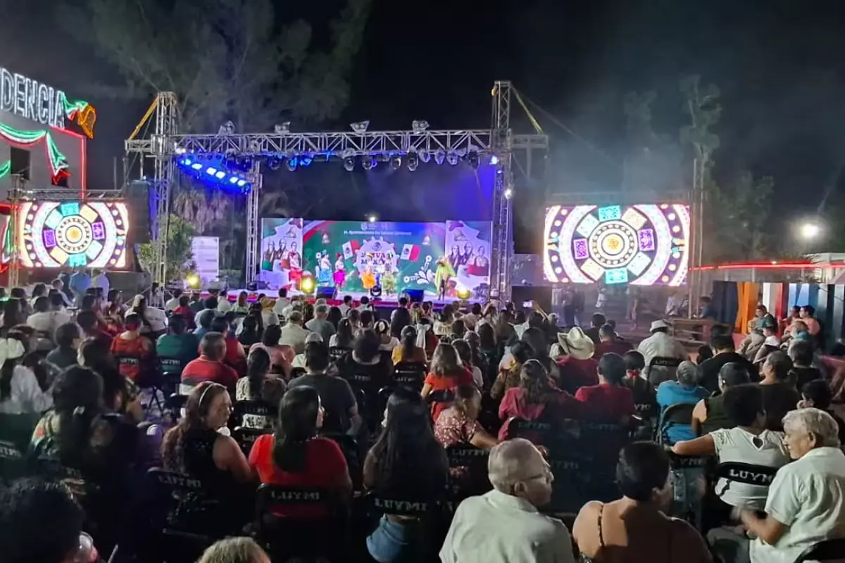 Families gather in a plaza in Quintana Roo during celebrations marking the 216th anniversary of Mexico's independence