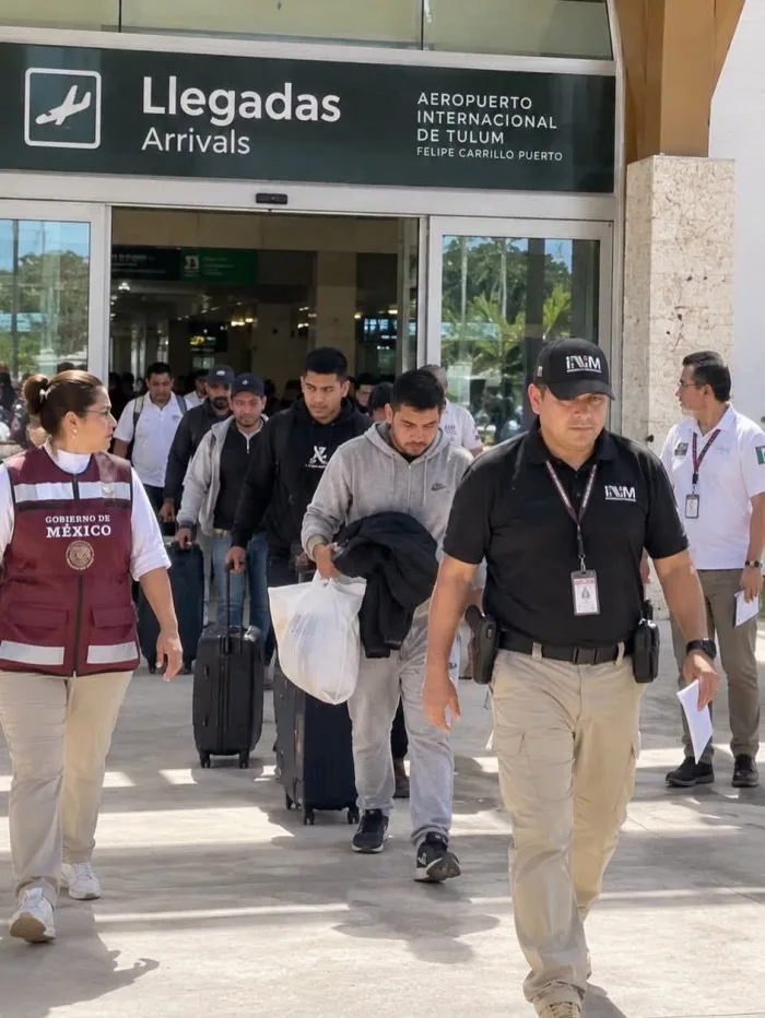 Repatriated Mexican nationals arriving at Tulum International Airport on a deportation flight from the United States