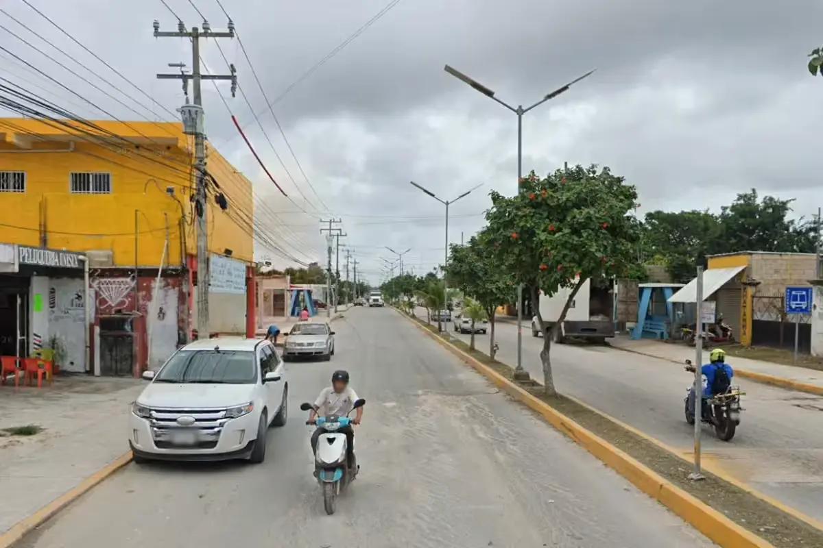 Residents of the continental zone of Isla Mujeres stand on an unpaved lot where they want the municipal government to build a cemetery, market and slaughterhouse