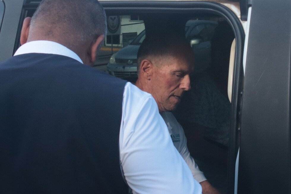 Martin Robinson, father of Australian brothers Callum and Jake Robinson, leaves a courthouse in Ensenada, Mexico, during the trial of three men accused in their 2024 killings.