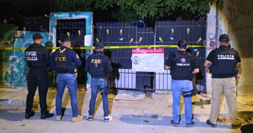 Police officers inspect seized evidence during drug raids in Playa del Carmen and Cozumel, Quintana Roo.