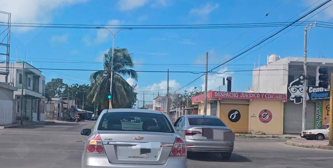 Municipal police officers patrol a street in Bacalar, Quintana Roo, near the Laguna de los Siete Colores