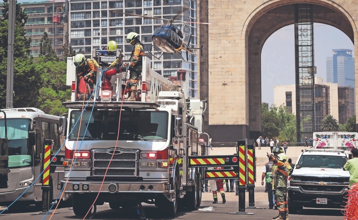 Emergency responders and rescue crews take part in a national earthquake drill in Mexico City