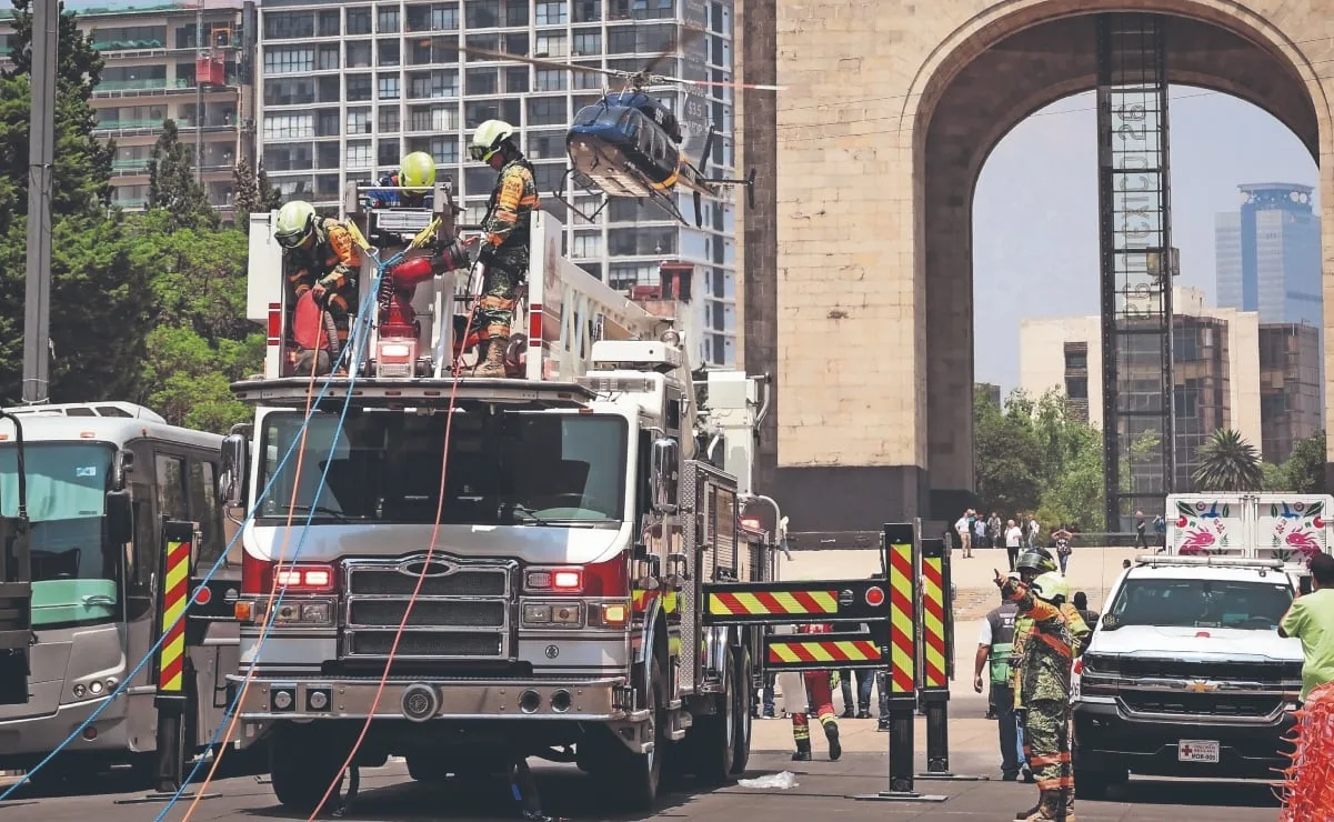 Emergency responders and rescue crews take part in a national earthquake drill in Mexico City