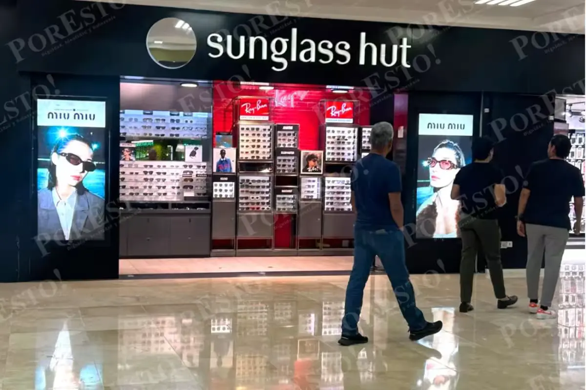 Travelers walking through a terminal at Cancún International Airport in Quintana Roo, Mexico