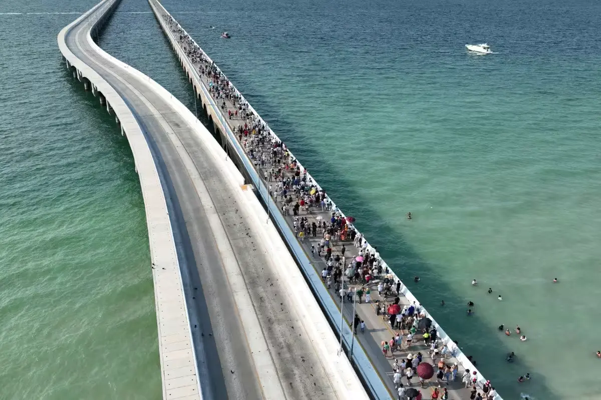 The Muelle de Arcos pier stretching into the sea at Progreso, Yucatan, where visitors will walk at sunset to mark its 85th anniversary
