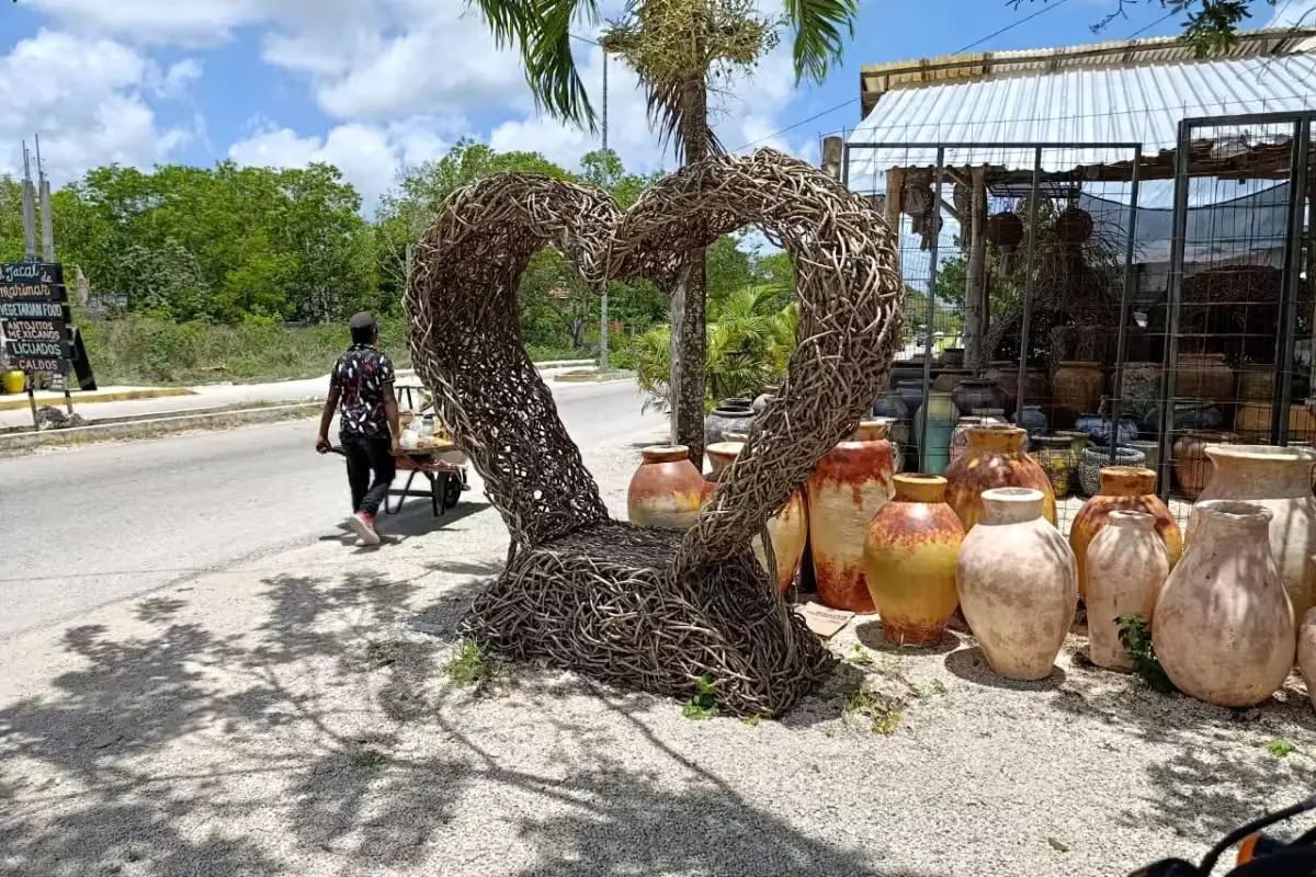Nearly empty street in an inland Maya community along the road between Tulum and Cobá, where small shops and restaurants depend on tourist traffic