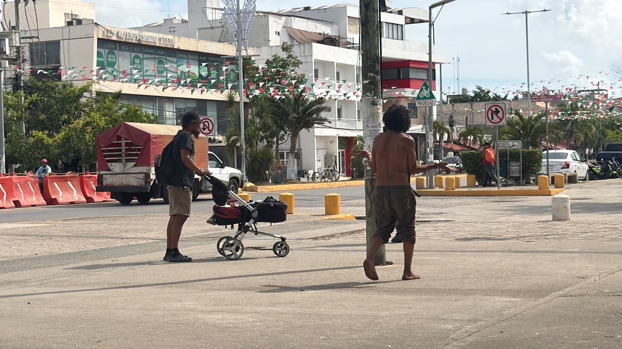 People living on the streets of downtown Tulum