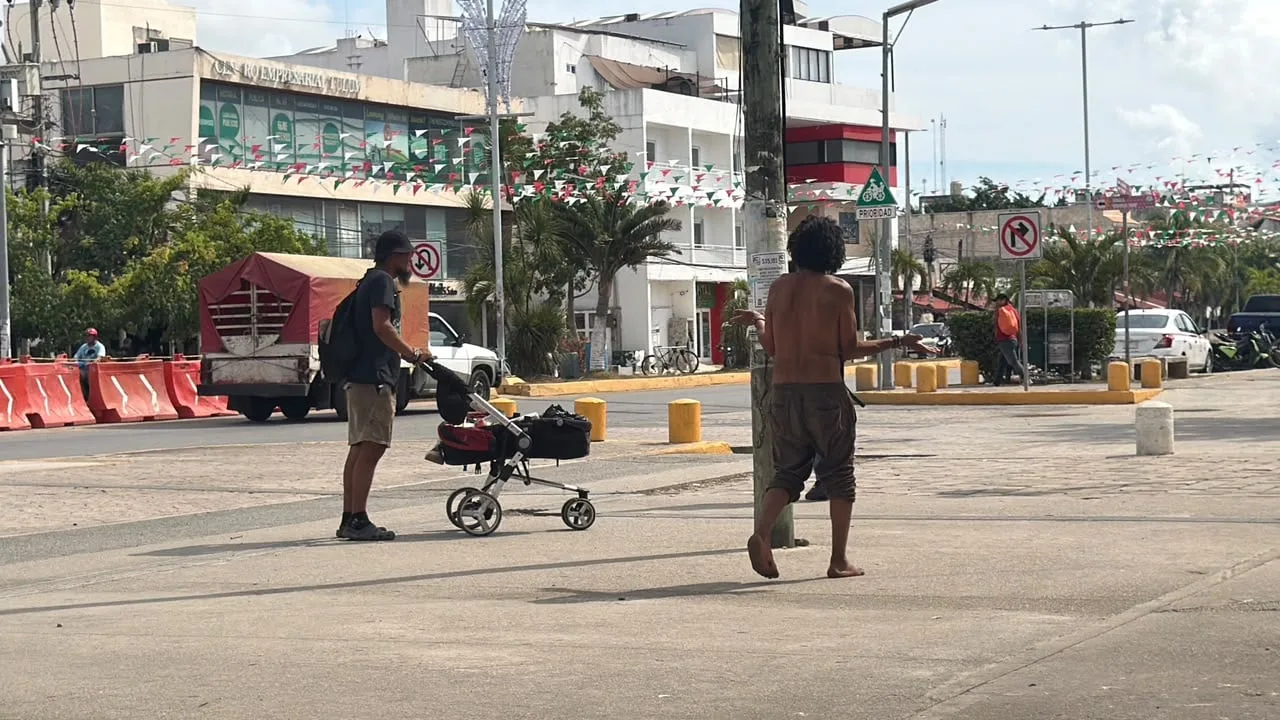 People living on the streets of downtown Tulum