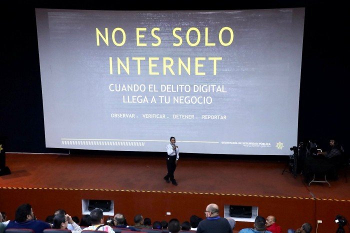 Yucatan Public Security Department officials meet with business representatives to discuss phone extortion and virtual kidnapping scams.