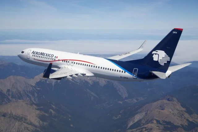 An Aeroméxico commercial aircraft parked on the tarmac at a Mexican airport