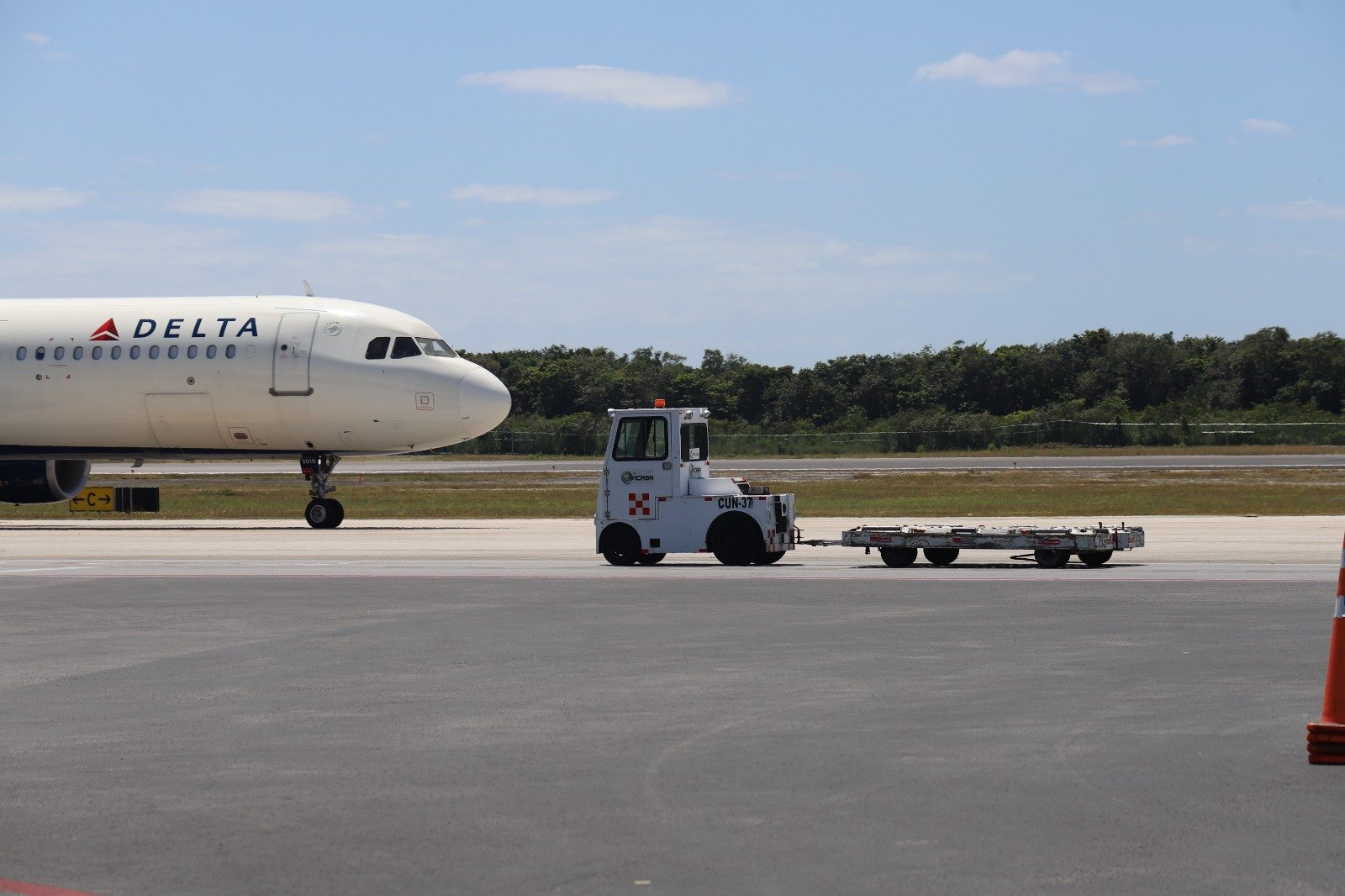 Passenger aircraft on the tarmac at Cancun International Airport in Quintana Roo, Mexico