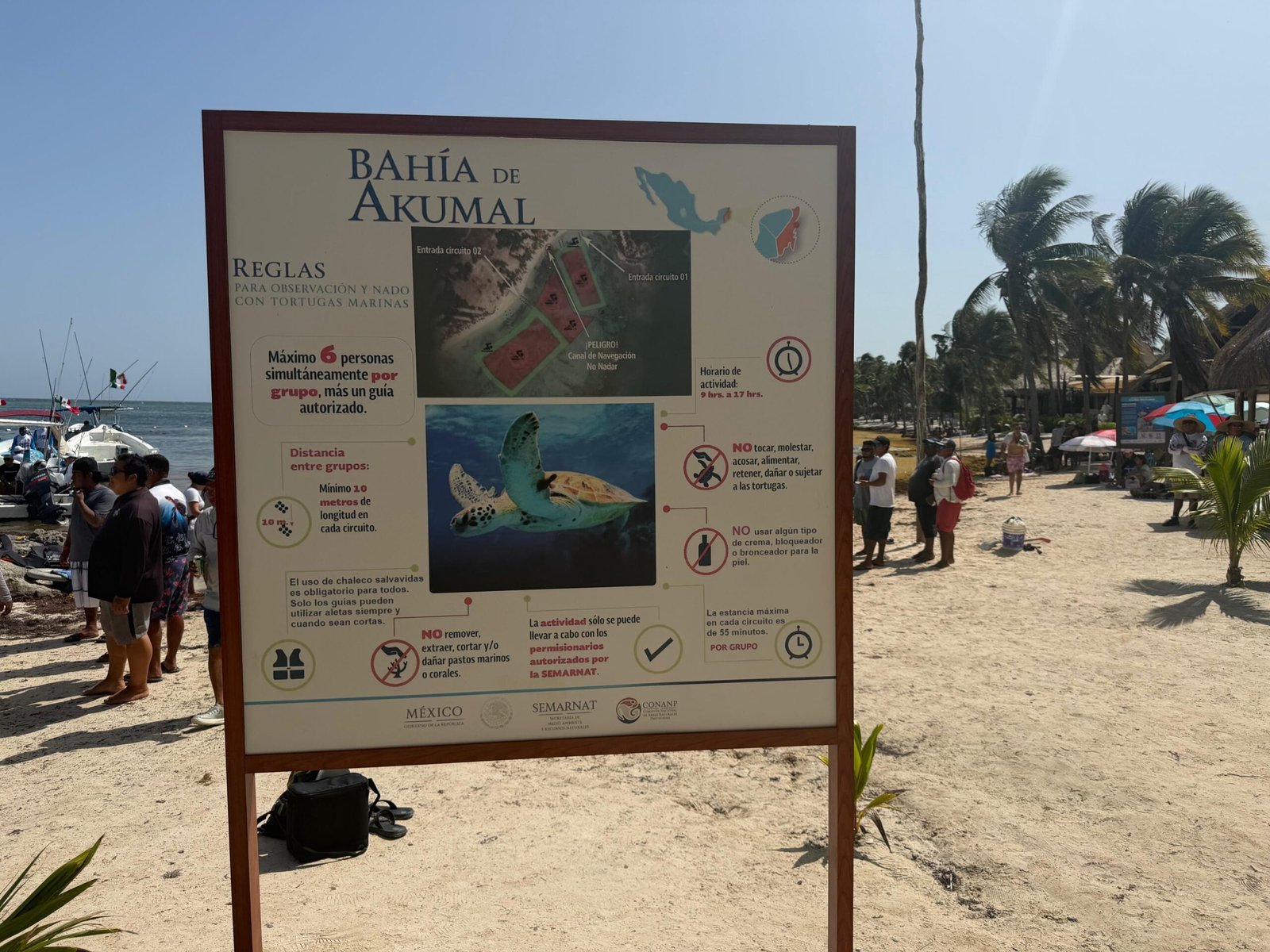 Boats and water sports equipment on the beach at Akumal, Quintana Roo, where cooperatives have resumed operations amid weak tourism