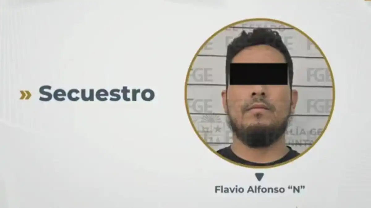 Police officers escort a suspect arrested in connection with a 2013 kidnapping in Cancún, Quintana Roo