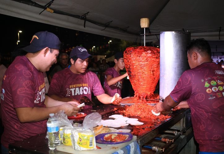 Tacos al pastor served at a traditional taquería in Cancún