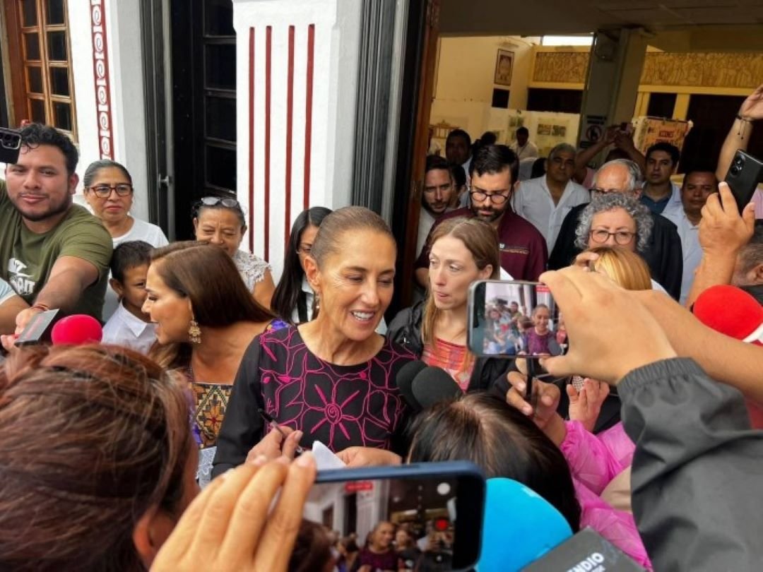 President Claudia Sheinbaum greets residents and patients' relatives during a tour of a public hospital in Chetumal, Quintana Roo