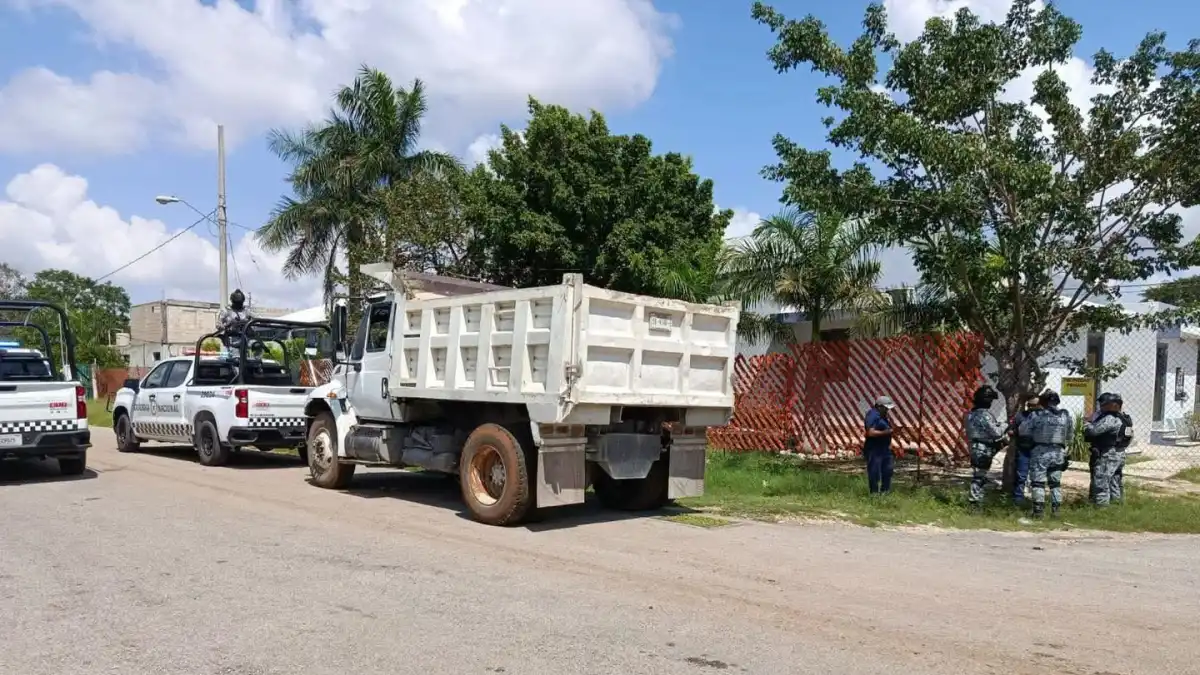 A dump truck travels along a road in Yucatán, where freight operators have reported attempted extortion through staged kidnappings