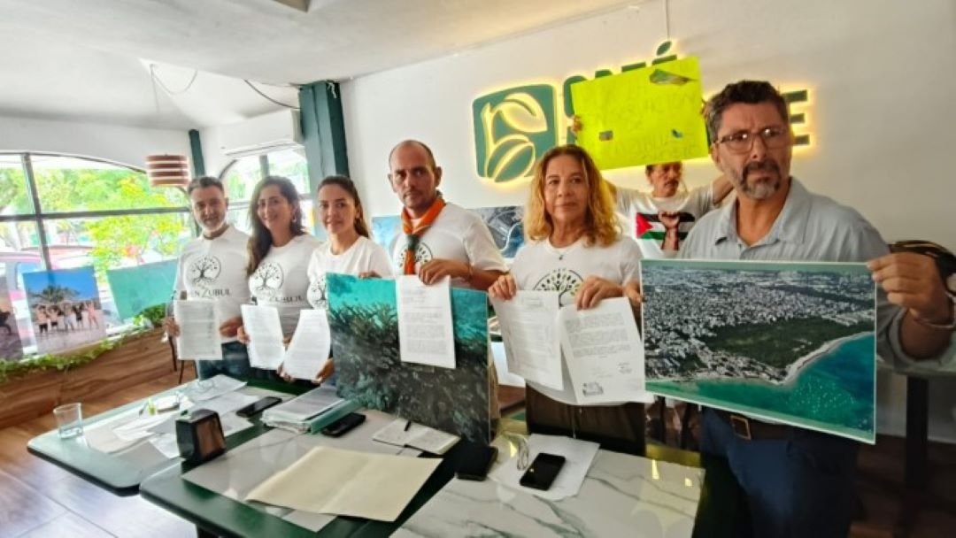 Members of the Red por Chen Zubul environmental coalition speak at a press conference in Playa del Carmen about protecting the Chen Zubul property
