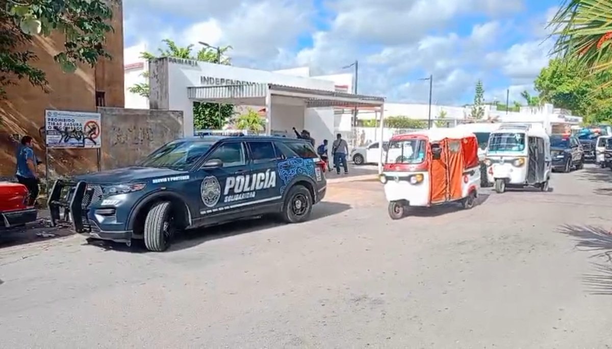 Emergency crews and parents gathered outside Independencia de Mexico elementary school in Playa del Carmen after a nearby gas leak sickened students