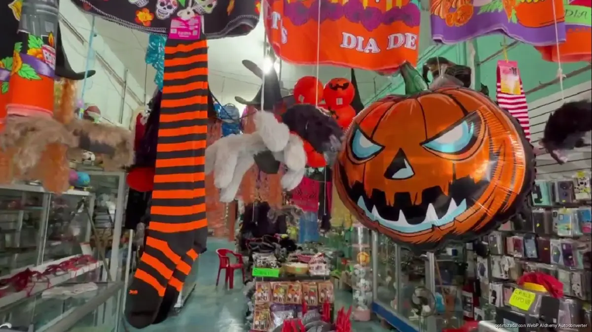 Shelves of Halloween accessories and Day of the Dead decorations at a novelty shop in Tulum, Quintana Roo