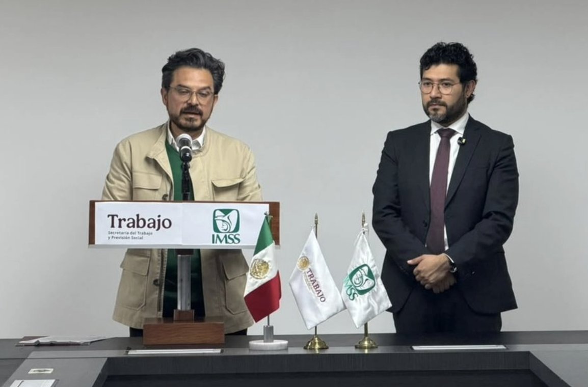 IMSS director Zoé Robledo and Labor Secretary Marath Bolaños speak at a press conference announcing an 8 percent wage increase for institute workers