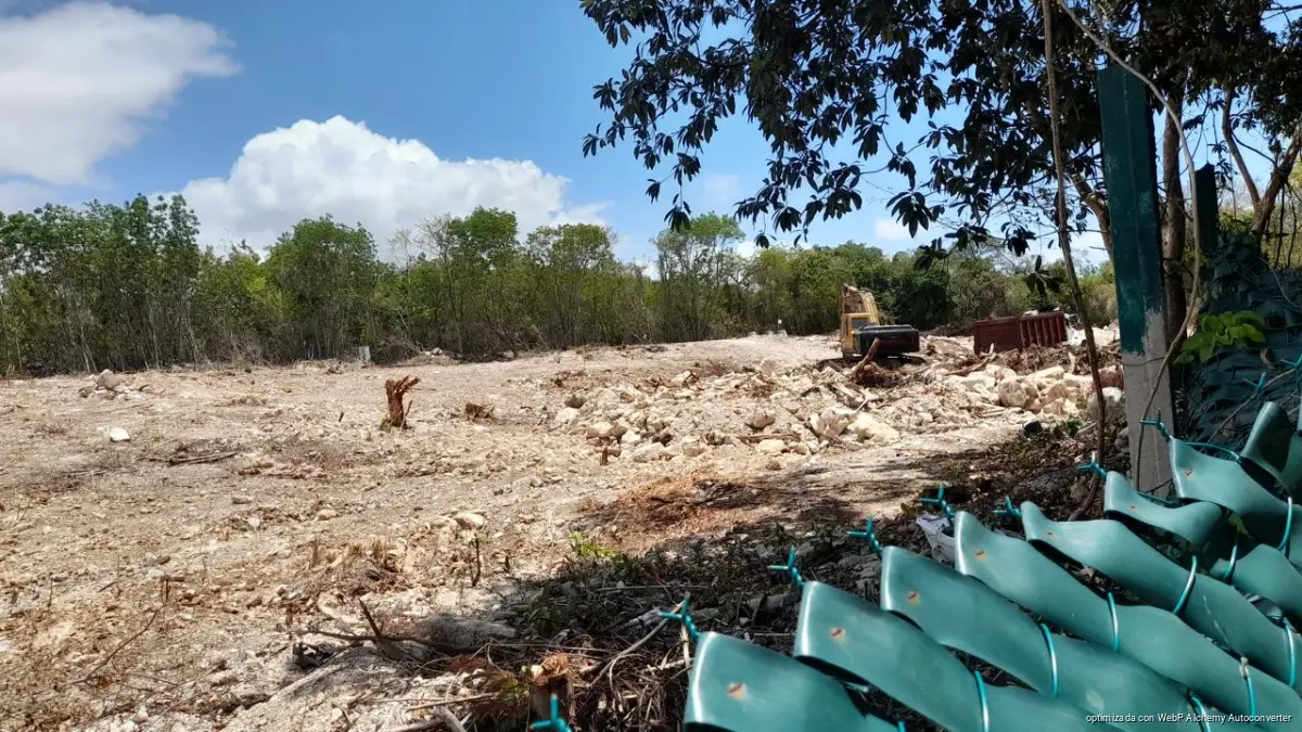 Closure seals mark the halted Macondo Playacar construction site in Playa del Carmen, Quintana Roo