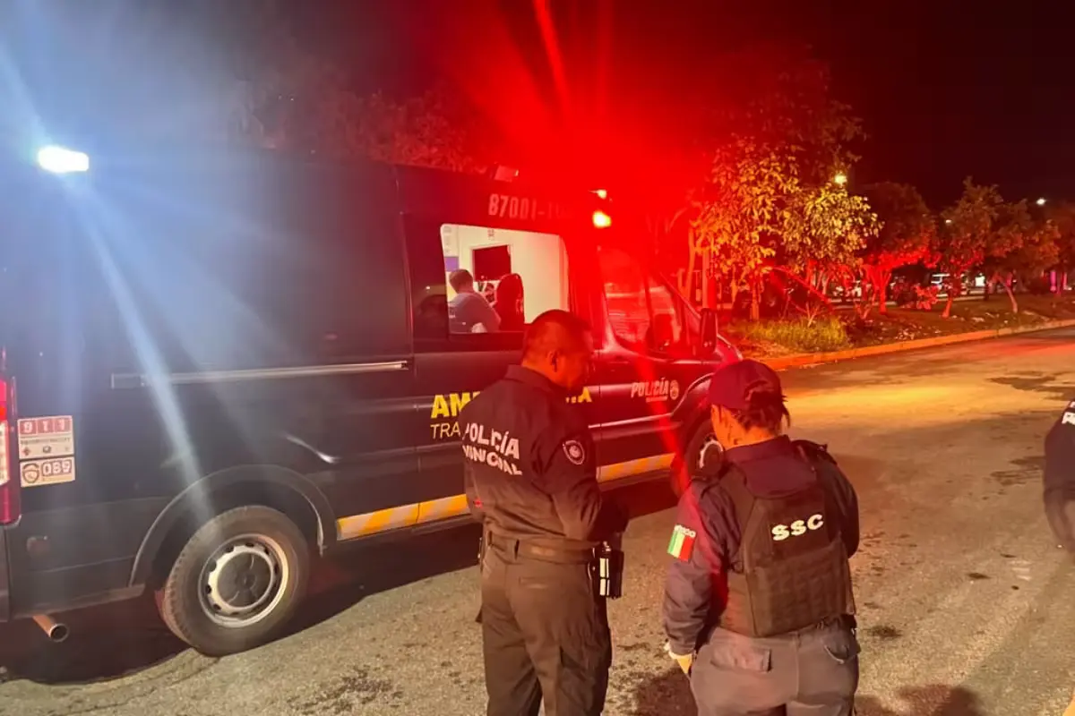 Emergency crews at the scene after police rescued a mother and her son from a house fire in the Pescadores neighborhood of Playa del Carmen