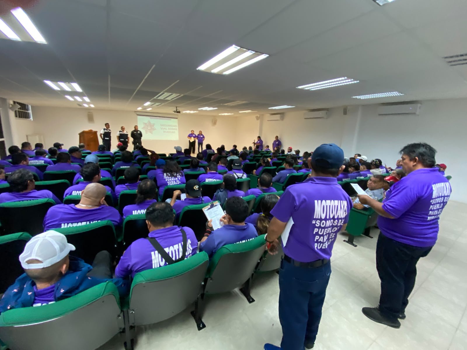 Mototaxi drivers in Cozumel gather for a two-day road safety course taught by municipal traffic officers