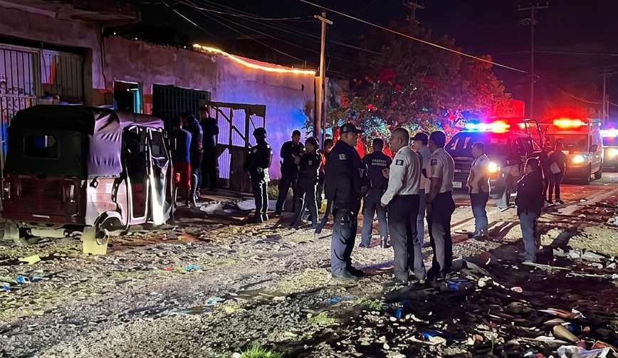 Police cordon off a street in Cancún after three separate shooting attacks targeting mototaxi drivers