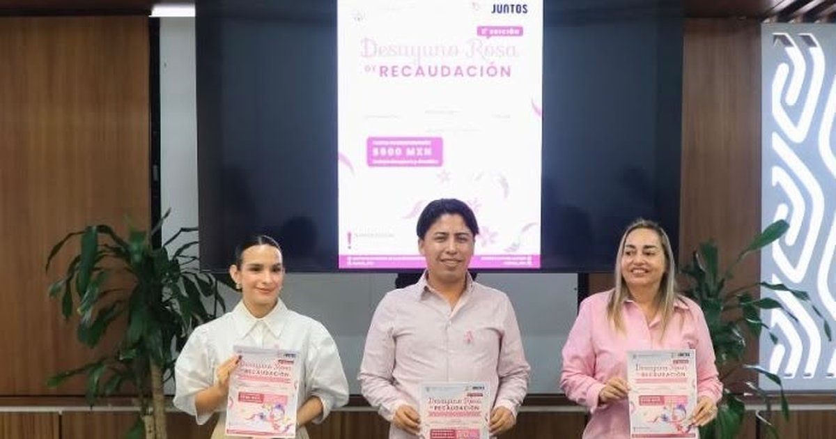 Attendees at a pink-themed breast cancer awareness breakfast fundraiser in Playa del Carmen