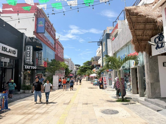 Nighttime street scene with bars and restaurants in Playa del Carmen, Quintana Roo