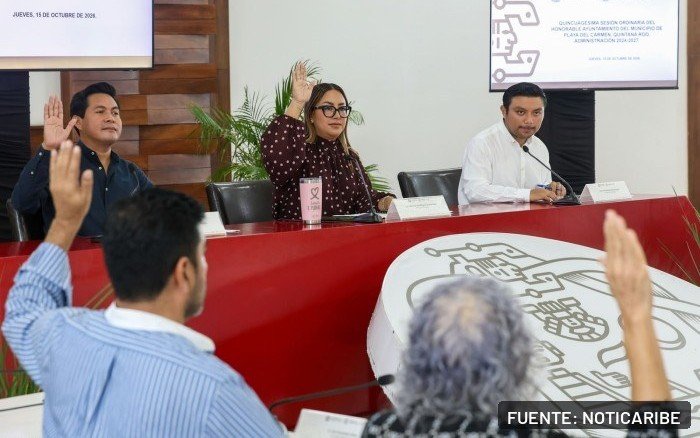 Members of the Playa del Carmen municipal council meet in session at the Leona Vicario auditorium