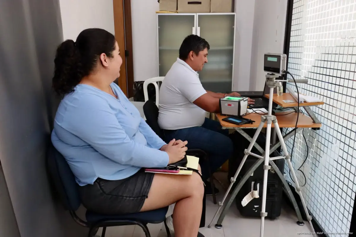 Residents waiting to register for biometric CURP identity cards at the Civil Registry office in Plaza Oasis, Puerto Morelos