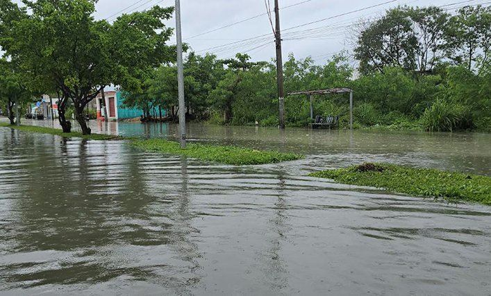 Stormwater drainage infrastructure and flooded street in Chetumal, Quintana Roo