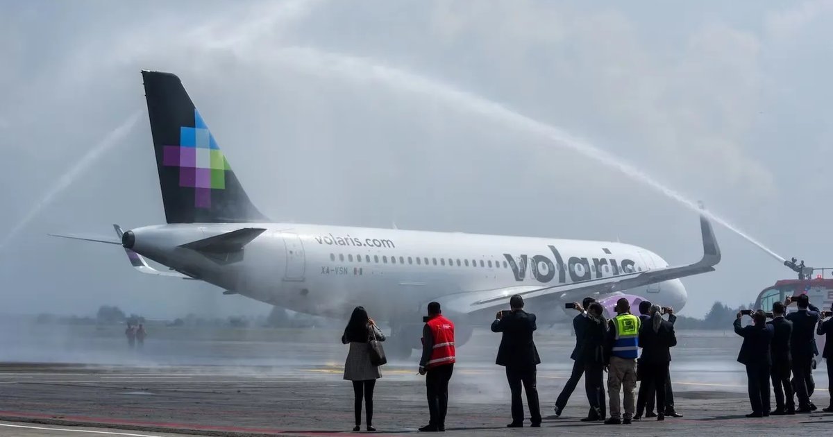 A Volaris passenger jet on the tarmac at Tulum International Airport Felipe Carrillo Puerto
