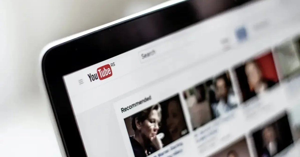 YouTube logo on a screen during a company presentation